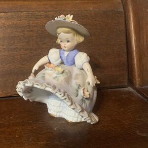 Vintage porcelain bloomer girl
